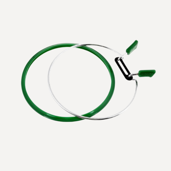 Nurge spring tension embroidery hoop with plastic outer ring and metal inner frame, available in sizes 5.8–19.5 cm in random colors.