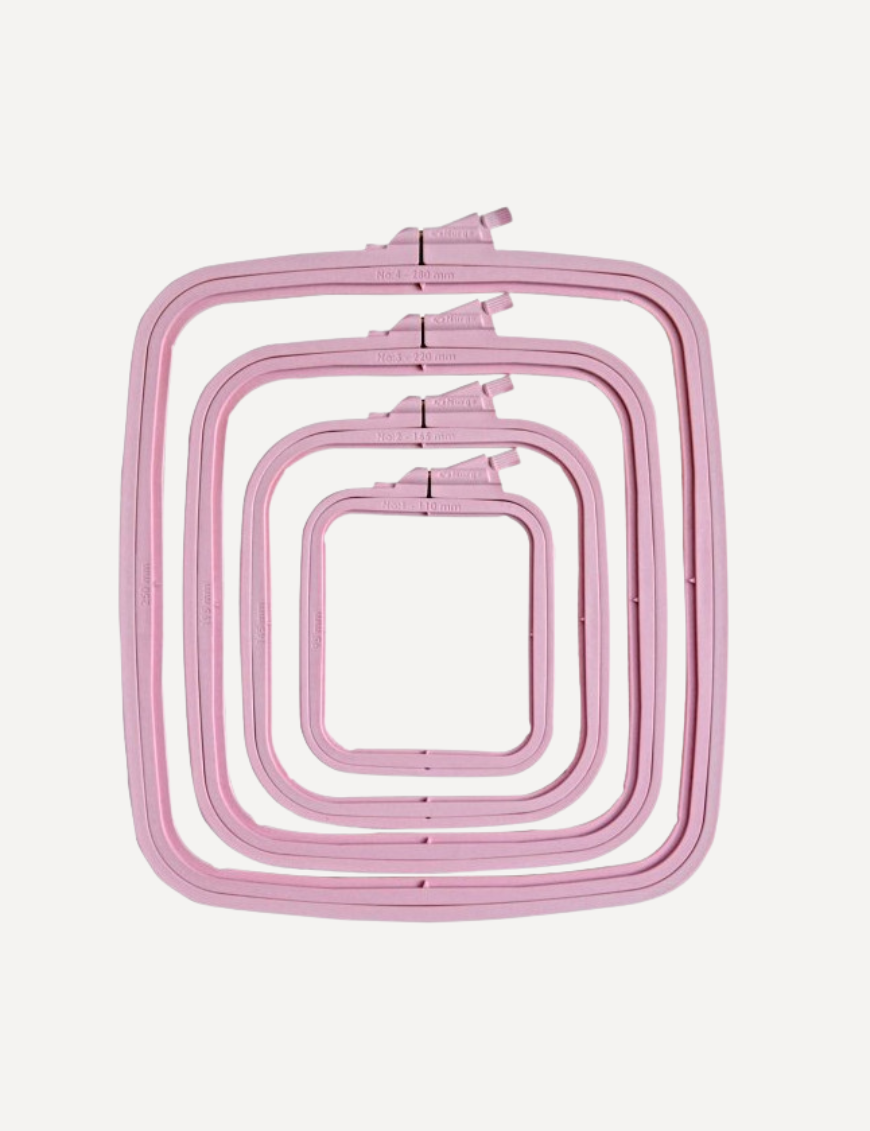 Nurge square pink plastic embroidery hoop frame in various sizes from 11 cm to 28 cm, designed for cross stitch and needlework.