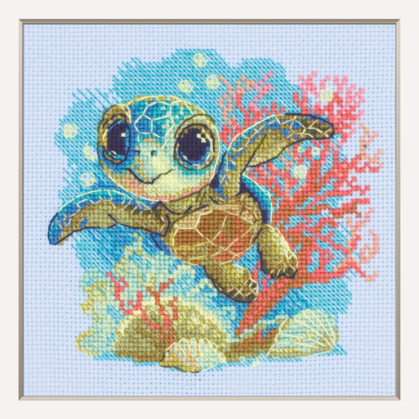 Cross-stitch kit showing a baby sea turtle underwater with coral, seashells, and a blue ocean background.