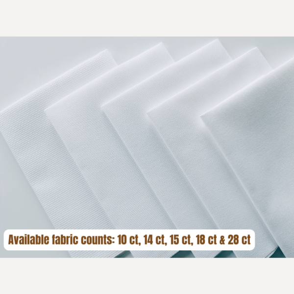 Close-up of Zweigart 10 count white Aida fabric showing the evenweave grid texture.