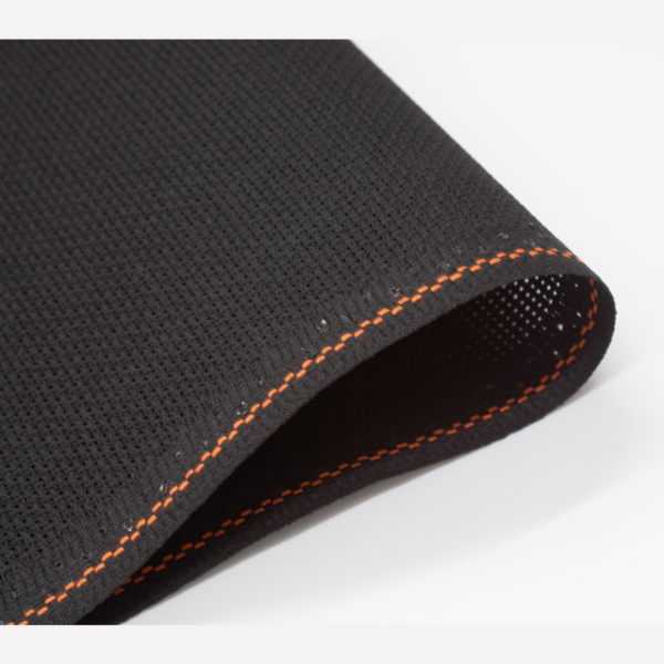 Close-up of Zweigart 10 count black Aida fabric showcasing its distinct, easy-to-stitch evenweave grid and deep black color.
