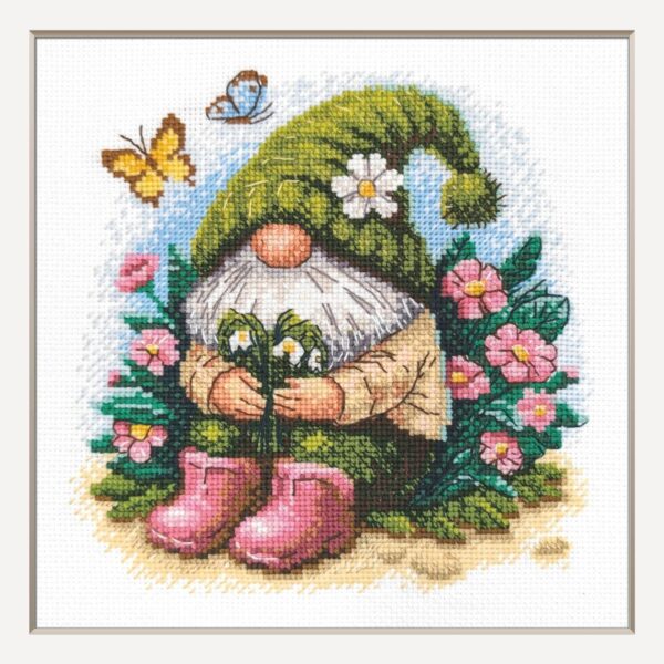 A1042 Blossom Gnome Aine Cross-Stitch Kit featuring a garden gnome in a green hat surrounded by pink flowers, foliage, and butterflies.
