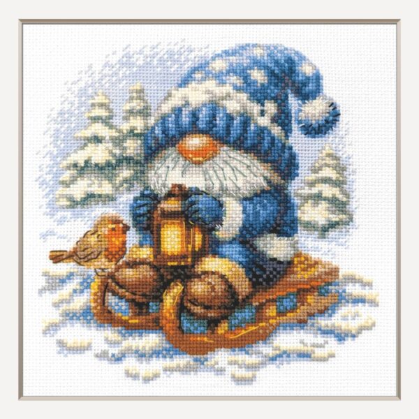 A1045 Snowy Gnome Aine Cross-Stitch Kit featuring a winter gnome with a blue snowy hat, glowing lantern, wooden sled, bird, and snow-covered evergreen trees.